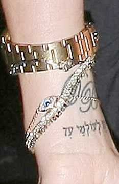 Victoria Caroline Beckham Wrist Tattoo